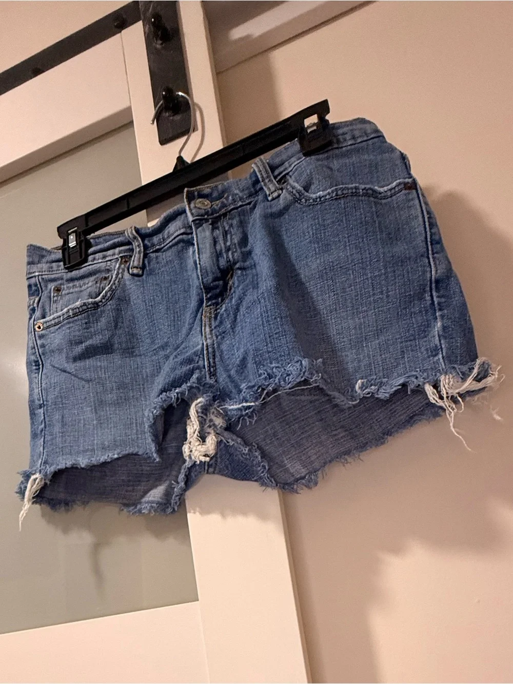 Levi's Distressed Mid-Blue Denim Cutoff Shorts